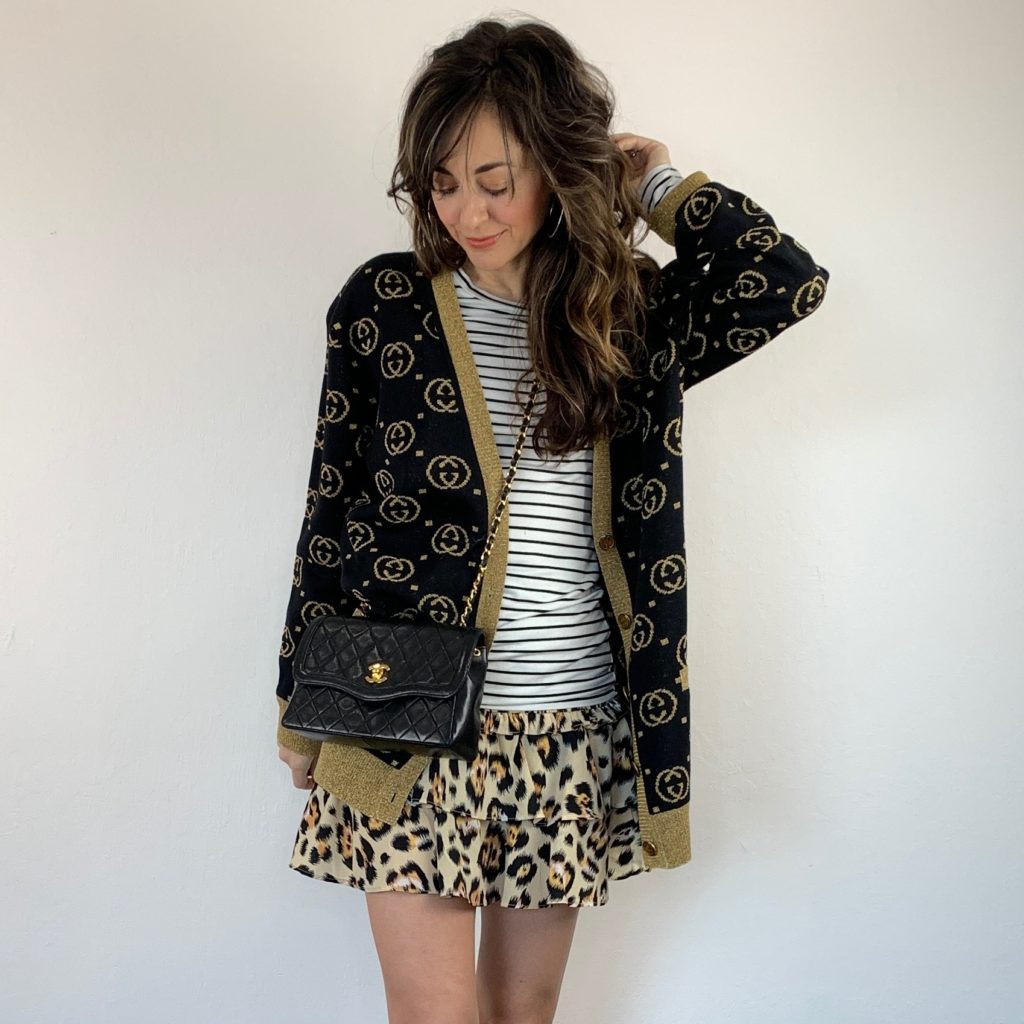 Jennifer Sattler Stylist Black quilted Chanel handbag black and white striped t shirt neutral leopard print skirt gucci print sweater
