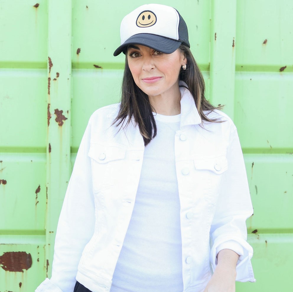 Spring Capsule Wardrobe
trucker hat with smiley face
white jean jacket
