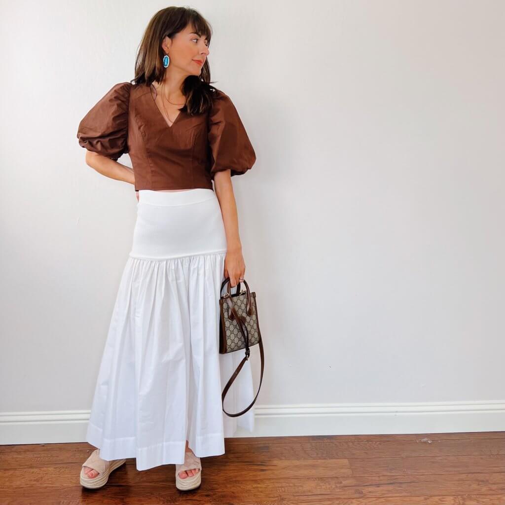 white skirt brown puff sleeve top white skirt gucci mini purse
marc fisher sandal brow puff sleeve
