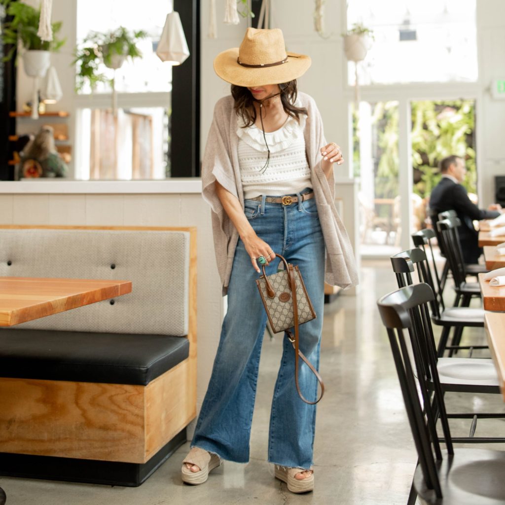 white crochet tank top from Saks on Jennifer Sattler Stylist Cafe Bernardo Sacramento CA  steet style hat with chin strap mono gram gucci mini bag 
thin gucci belt closet choreography tomcat roller mother jeans plaform sandals march fisher
