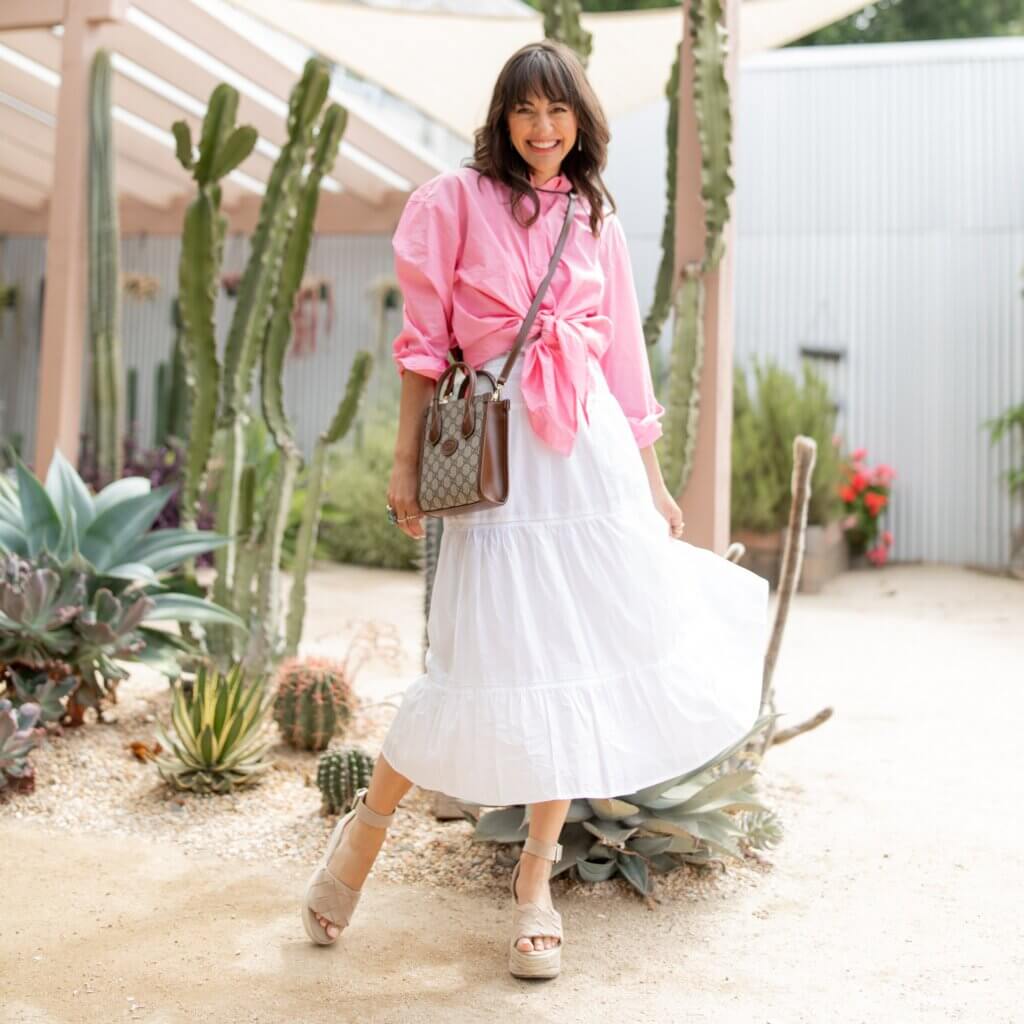 the prickly pear sacramento pink shirt button up outfit tied with white skirt and platforms summer capsule wardrobe
