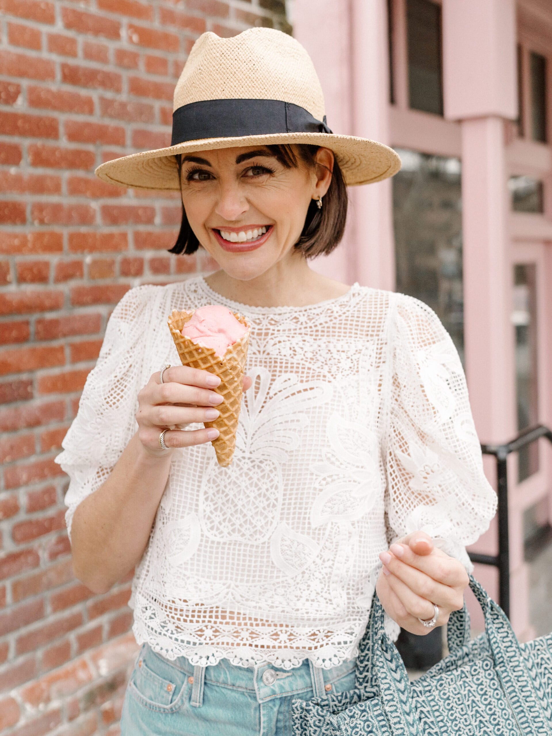 Jennifer Sattler Folsom CA eating pink icecream wearing white lace top straw hat